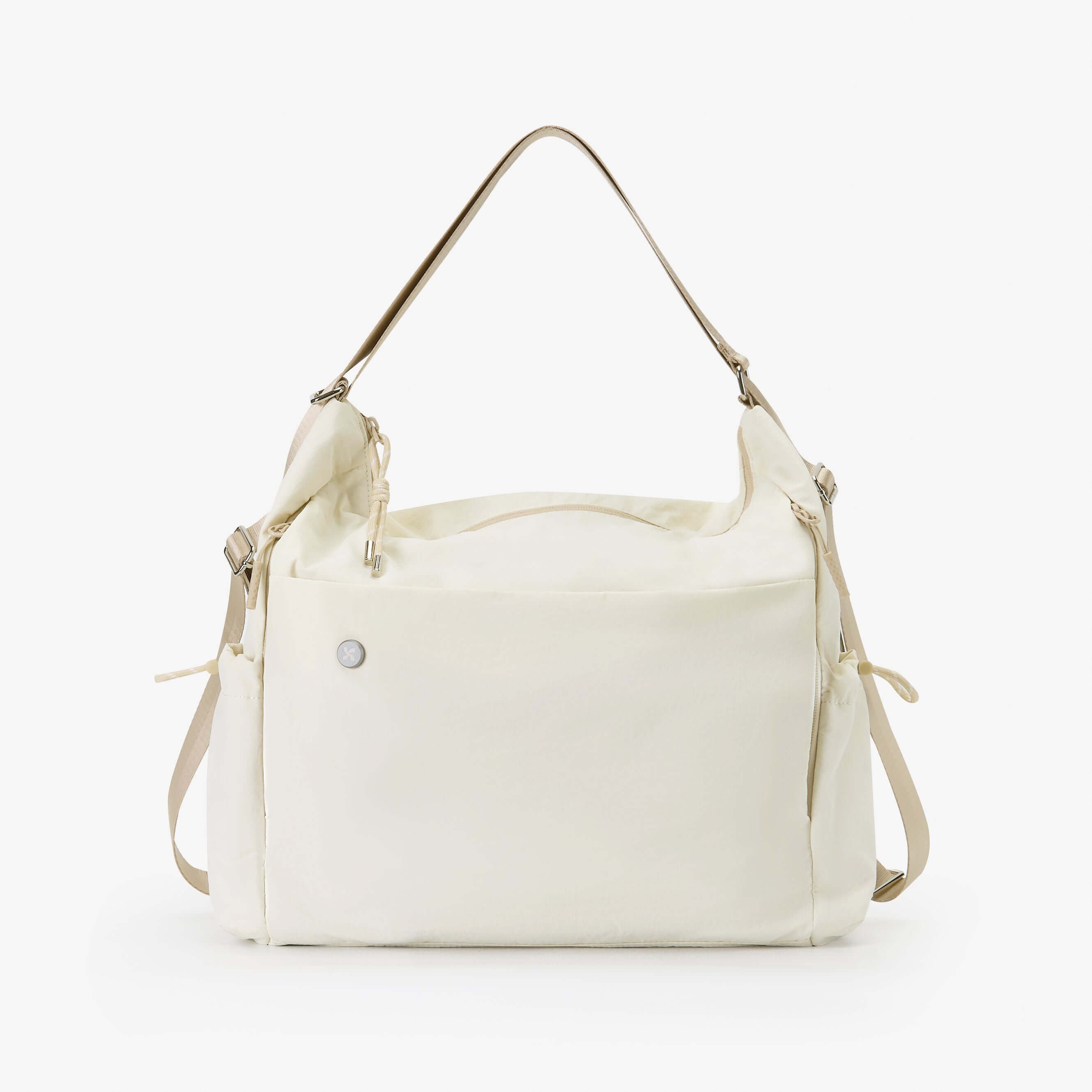 Air Convert Tote in organic fabric, versatile backpack or sling design, perfect for urban lifestyles and style.