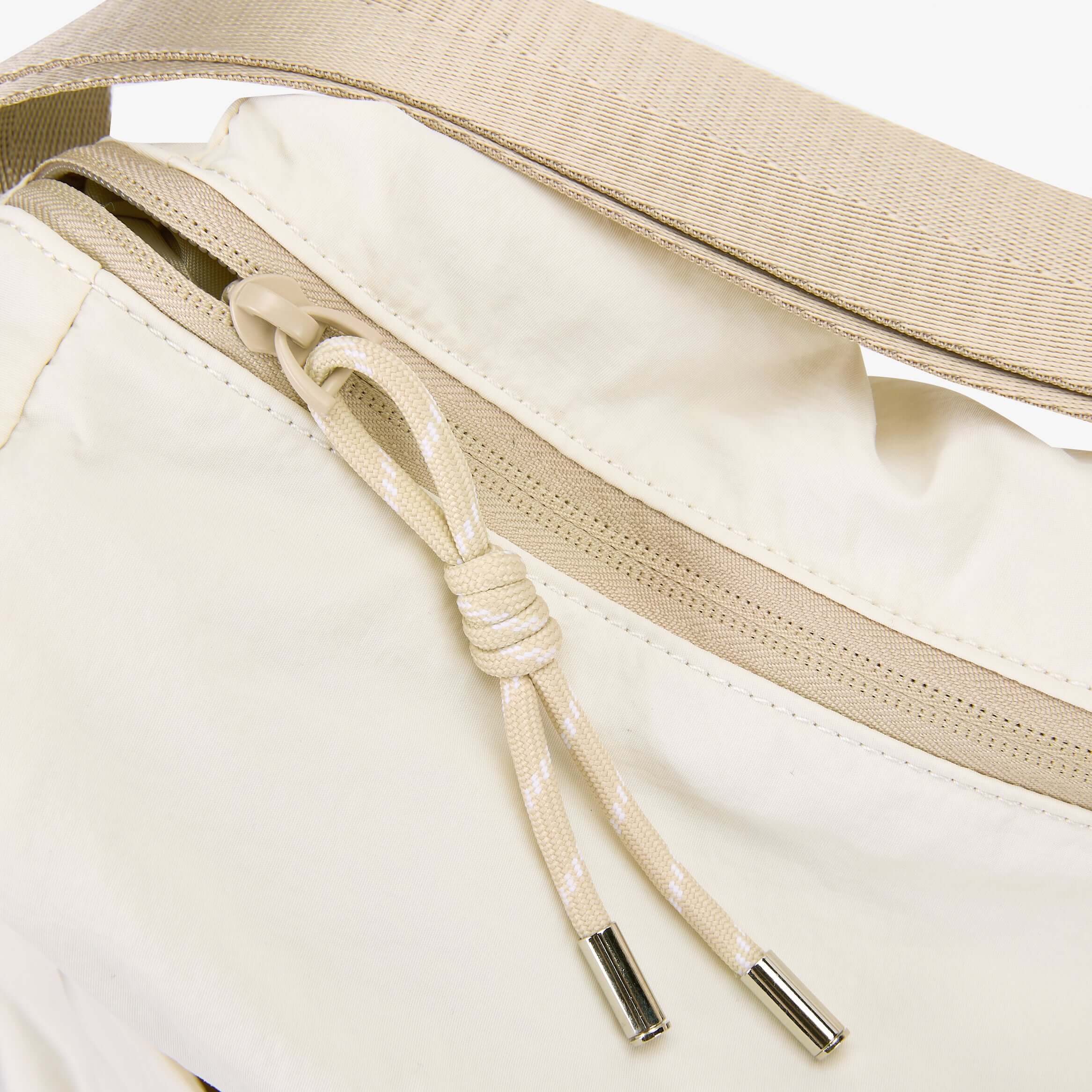 Close-up of the Air Convert Tote showcasing its organic fabric and stylish drawstring closure.