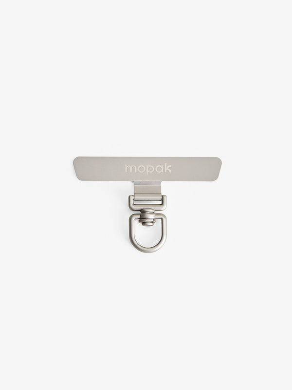 Universal phone strap adapter by MOPAK for attaching wrist straps to phone cases.